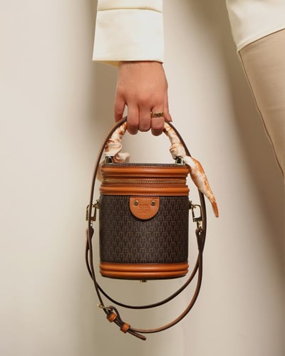 شنطة نسائية إمزوري بلون بني