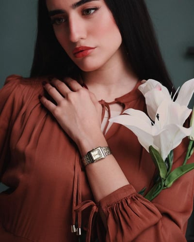 ساعة نسائية من امزوري بلون فضي