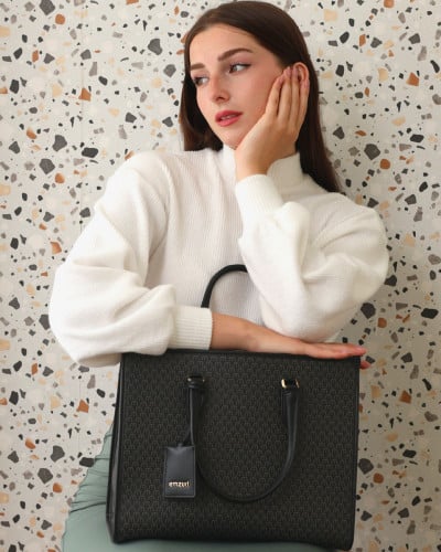 شنطة نسائيه من الجلد بلون أسود