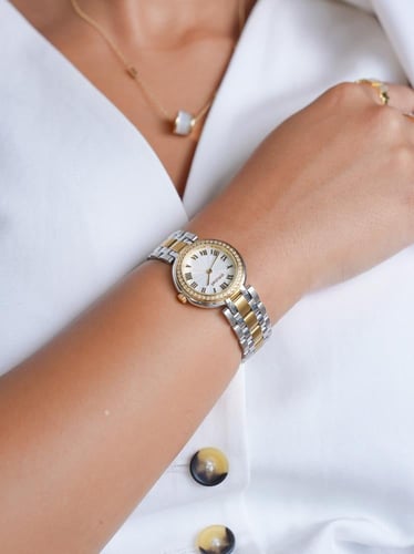 ساعة نسائية من امزوري بلون ذهبي وفضي