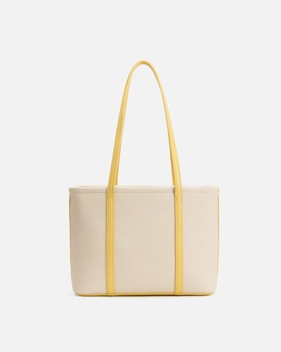 شنطة نسائية كلاسيك بلون أصفر وبيج من امزوري