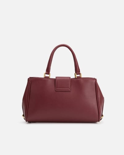 شنطة نسائية أنيقة بلون عودي من امزوري