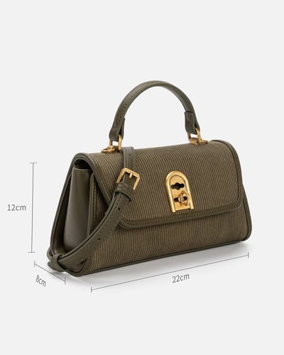 شنطة نسائية مميزة بلون أخضر من امزوري