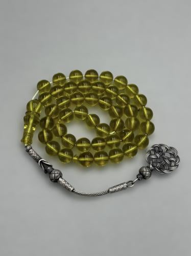 سبحة زعفرانية | عشبي شفاف مع طرابزونة فضة