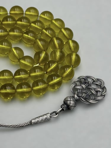 سبحة زعفرانية | عشبي شفاف مع طرابزونة فضة