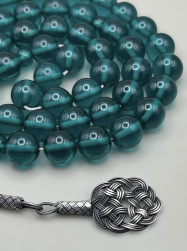 سبحة زعفرانية | تركواز شفاف مع طرابزونة فضة