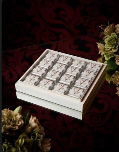 A luxurious box containing 16 pieces of chocolate...