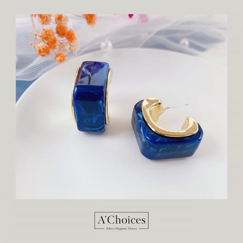 اقراط مطلية بالذهب مصنوعة من الريزن المموج بألوان...