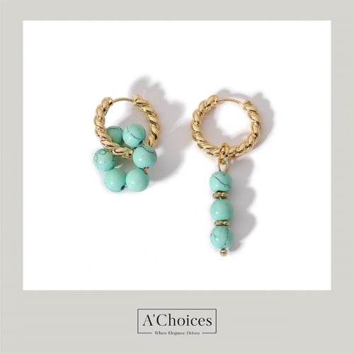 اقراط ذهبية مزينة باحجار كريمة بتصميم معاصر