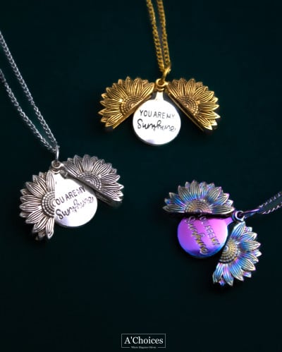 قلادة زهرة دوار الشمس منحوت بداخلها عبارة “YOU ARE...