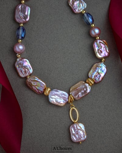 عقد أنيق مصنوع يدوياً مطلي بالذهب مع اللؤلؤ الزراع...