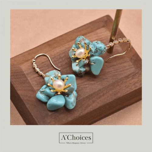 أقراط مصنوعة يدوياً من الفضة والنحاس المطلي بالذهب...