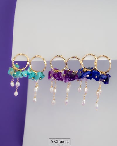 أقراط مصنوعة يدوياً من الفضة والنحاس المطلي بالذهب...