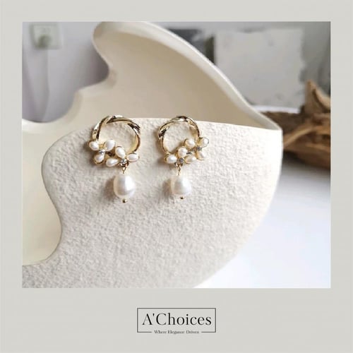 اقراط مطلية بالذهب مع اللؤلؤ الزراعي والزيركون بلو...