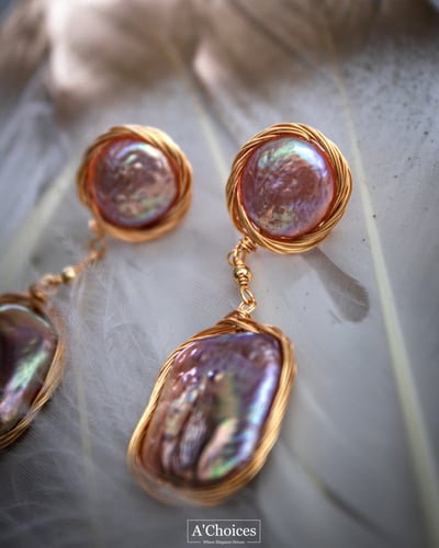 أقراط مصنوعة يدوياً من الفضة والنحاس المطلي بالذهب...