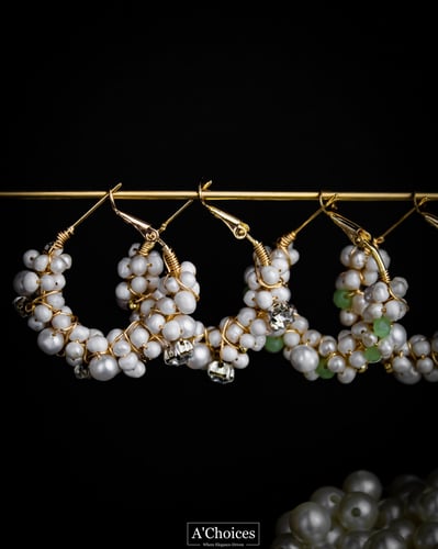 أقراط مصنوعة يدوياً من الفضة والنحاس المطلي بالذهب...