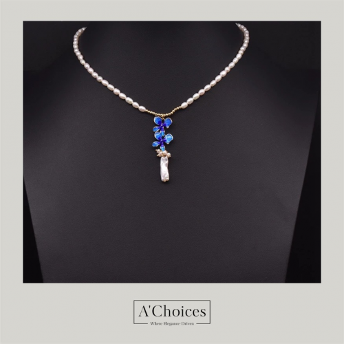 طقم مكون من عقد وأقراط من اللؤلؤ الزراعي والمطلي ب...