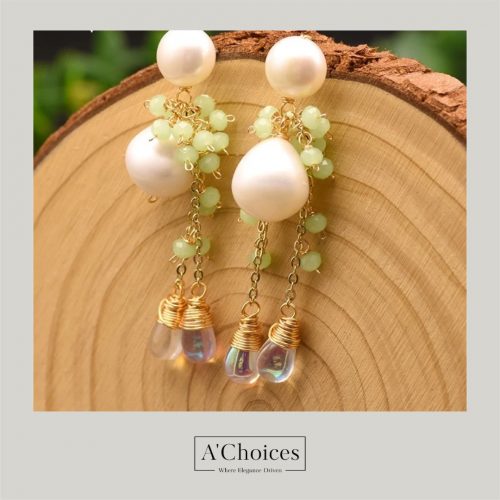 أقراط مصنوعة يدوياً من الفضة والنحاس المطلي بالذهب...