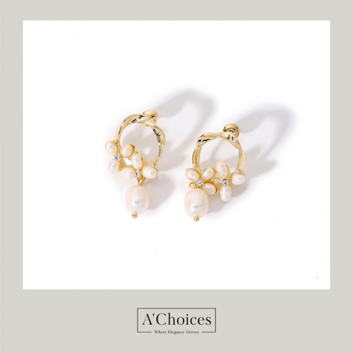 اقراط مطلية بالذهب مع اللؤلؤ الزراعي والزيركون بلو...