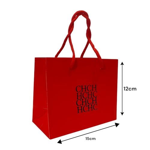 ‎اكياس توزيعات من ماركة كارولينا هريرا 12 حبة