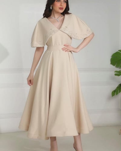 فستان سهرة كلفة تطريز