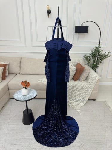 فستان سهرة كحلي باكمام ترتر