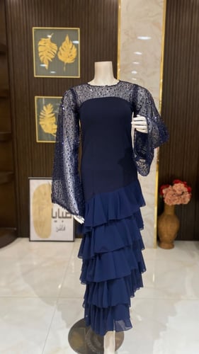 فستان طبقات بأكمام ترتر - تألقي بفخامة وإطلالة ساح...