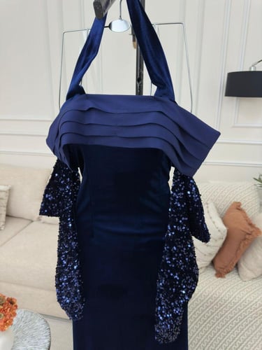 فستان سهرة كحلي باكمام ترتر