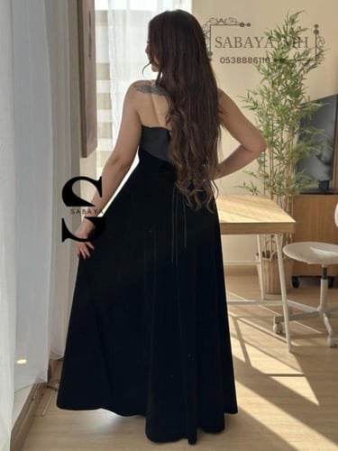 فستان سواريه أسود طويل - سحر الأناقة الكلاسيكية