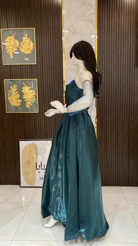 فستان سهرة اكمام تل