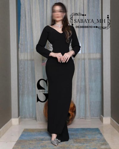 فستان سهرة اسود بتطيز جوانب