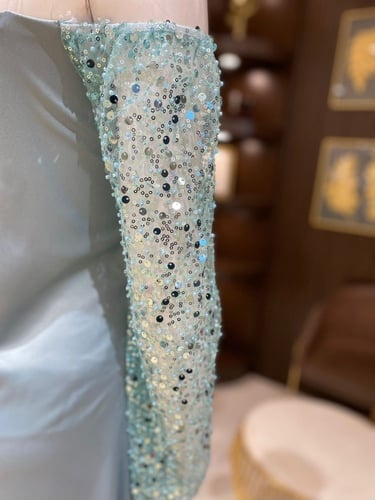 فستان برنسيسة بأكمام مطرزة ترتر ولؤلؤ - فخامة ساحر...