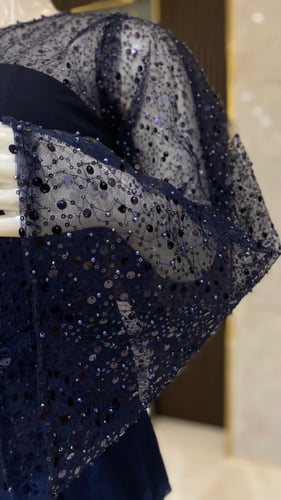 فستان طبقات بأكمام ترتر - تألقي بفخامة وإطلالة ساح...