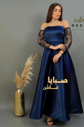 فستان سهرة تفته كم تل