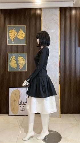 فستان سهرة أسود بكلفة بيضاء - أناقة بتفاصيل مميزة
