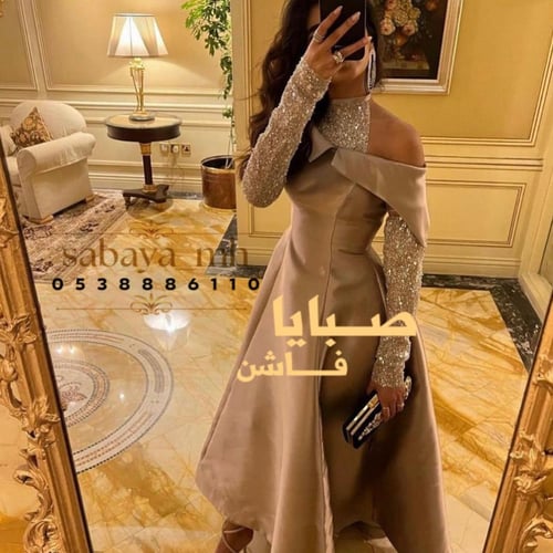 فستان كم طويل سهرة - إطلالة جريئة وفاخرة بأناقة لا...