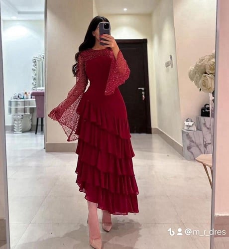 فستان طبقات بأكمام ترتر - تألقي بفخامة وإطلالة ساح...