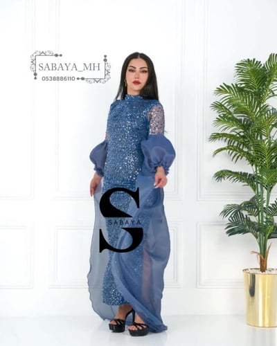 فستان سهرة ترتر سماوي باكمام اورجنزا