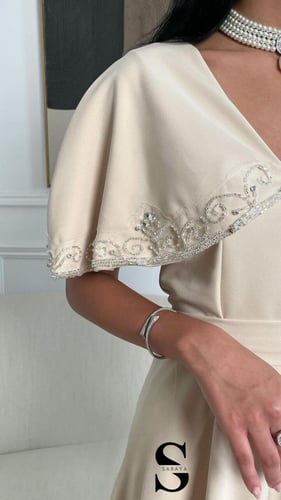 فستان سهرة كلفة تطريز