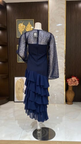 فستان طبقات بأكمام ترتر - تألقي بفخامة وإطلالة ساح...