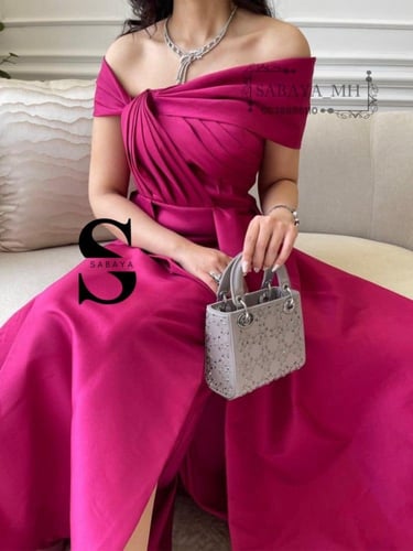 فستان سهرة فوشي طويل - تألقي بإطلالة أنيقة