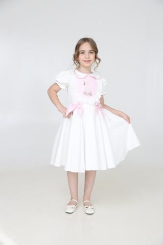 فستان ناعم بتطريرز على الصدر + فيونكة شعر