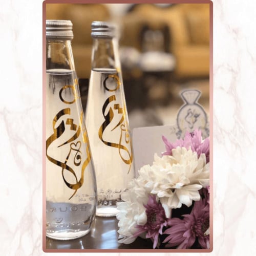 قارورة ماء زجاج