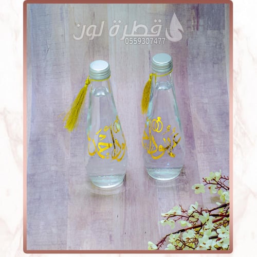 قارورة ماء زجاج