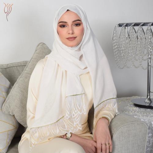 طرحة بوال أوف وايت بطرف تل وقيطان