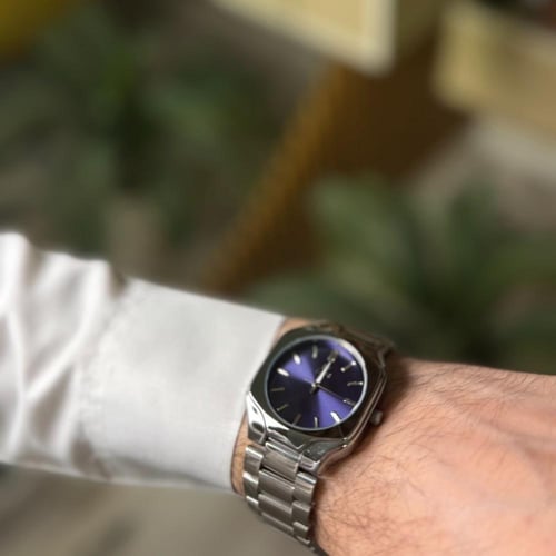ساعة رجاليه بسير فضي ميناء ياقوتي