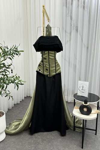 فستان سهره أوف شولدر بشال خارجي لون اسود و أخضر