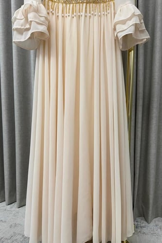 فستان سهرة اكمام طويلة بلون بيج