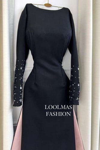 فستان سهره توب بأكمام طويلة وبذيل لون اسود