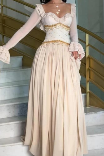 فستان سهرة اكمام طويلة بلون بيج